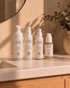 Rituel Signature composé de Première, Lumière Douce, Éclat Naturel et Voile Teinté.