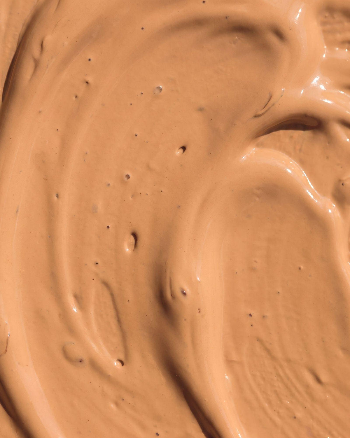 Texture de la crème solaire teintée SPF 30 Voile Teinté.